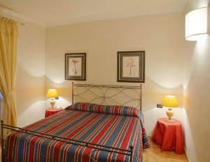 A stylish bedroom at the Palazzo Gamba